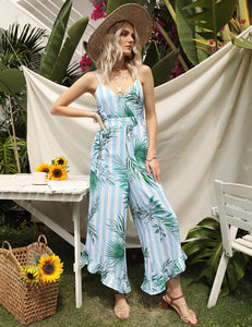 FANCYINN Womens Floral Loose Jumpsuits Rompers Spaghetti Strap Deep V Wide Leg Pants Ruffled Irregular Hem Summer Casual